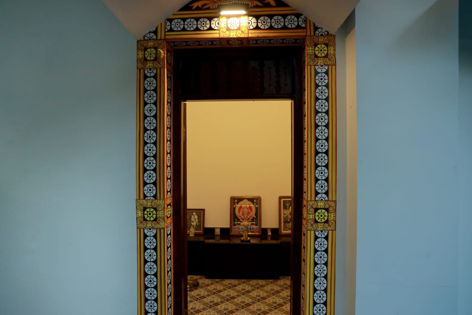 Hand-painted doorway leading to the family prayer room
